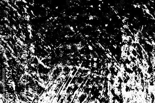 Black and white grunge texture. Black streaks of paint, ink, and dirt. Abstract monochrome background. Pattern of scratches, chips, and wear