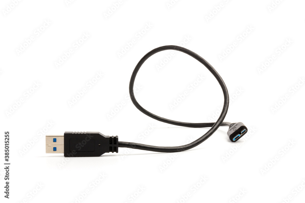 USB cable close up on white background. Charge, plugging, equipment and electricity USB cable close up on white background. Charge, plugging, equipment and electricity