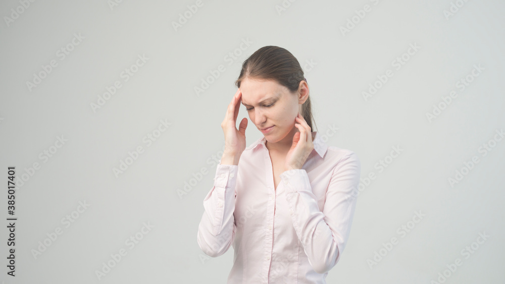Young beautiful woman has headache Young beautiful woman has headache