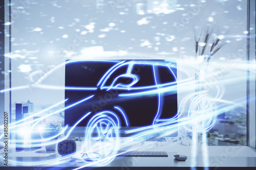 Desktop computer background in office with automobile hologram drawing. Multi exposure. Tech concept. © peshkova