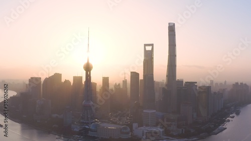 aerial view of Shanghai sunrise over the city skyline © wang