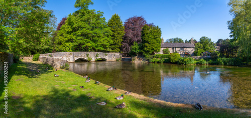 Ducks on the bank of River Wye, Ashford in the Water, Derbyshire Dales, Derbyshire, England, United Kingdom photo