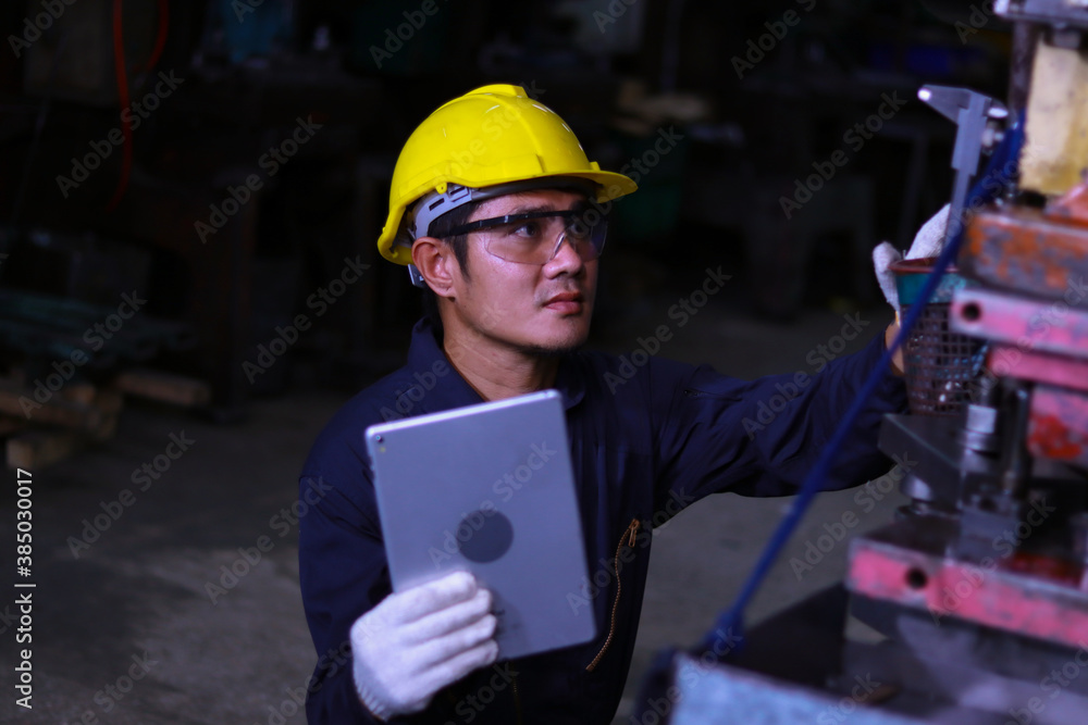 Young male engineer Asians are working Young male engineer Asians are working