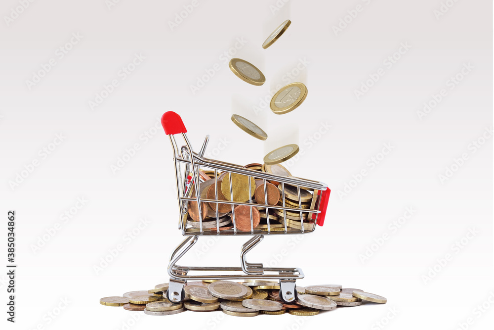 Φωτογραφία Shopping cart with falling euro coins  - Concept of shopping and economy