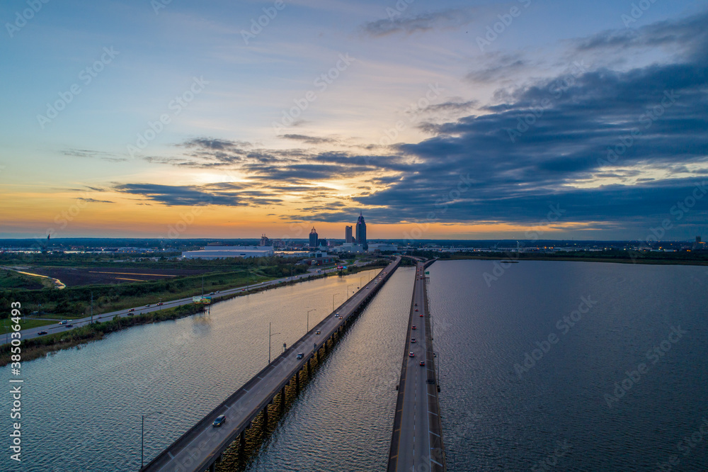 sunset over the mobile bay causeway 