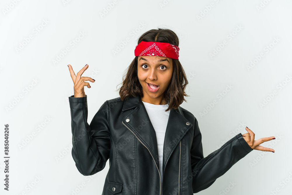 Young latin rocker woman isolated on white background Young latin rocker woman isolated on white background