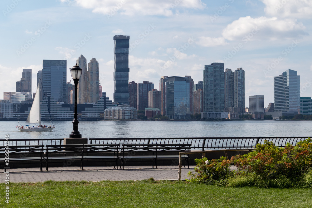 Jersey City Skyline seen from Rockefeller Park in Lower Manhattan along the Hudson River in New York City