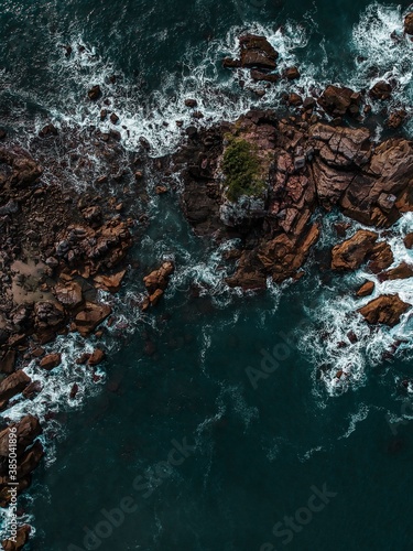 Waves crashing on rocks.