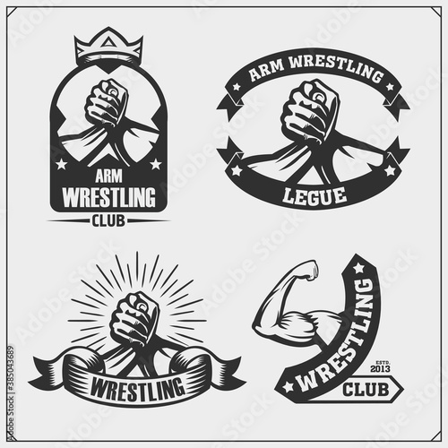 Set of arm wrestling club emblems, labels, badges and design elements. Print design for t-shirts.