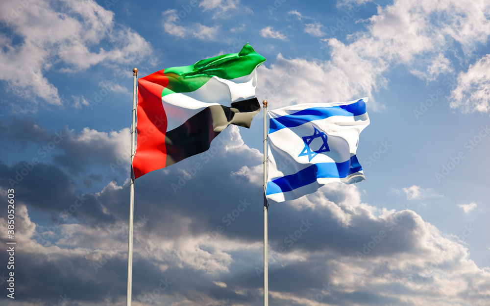 Flags of Israel and UAE together against the sky background. Jerusalem, Abu Dhabi Arab Emirates signed a historic deal to normalize interstate diplomatic, economic and trade relations. Flags of Israel and UAE together against the sky background. Jerusalem, Abu Dhabi Arab Emirates signed a historic deal to normalize interstate diplomatic, economic and trade relations.