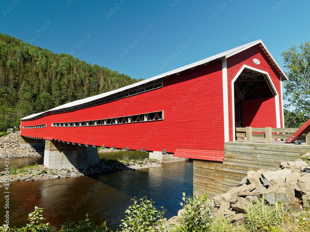Routhierville red covered bridge on Matapedia River, Quebec