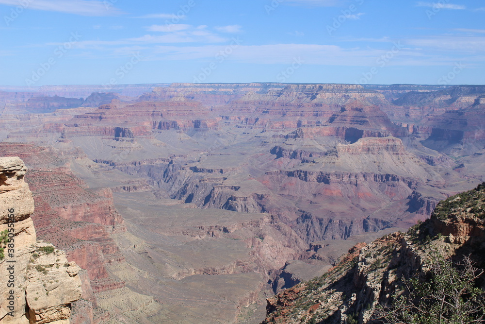 Panoramic view of Grand Canyon National Park's steep, wide canyon walls and multiple geologic formations. Panoramic view of Grand Canyon National Park's steep, wide canyon walls and multiple geologic formations.