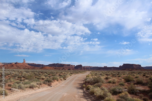 Scenic drive with a gorgeous southwest desert landscape featuring canyons and sandstone buttes in Valley of the Gods  Utah