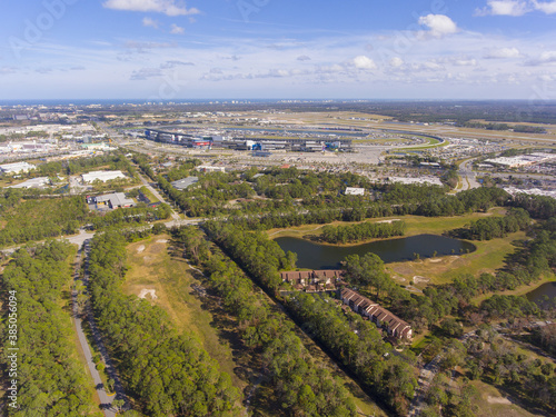 Daytona Beach International Speedway and city landscape aerial view  Daytona Beach  Florida FL  USA. It is the home for NASCAR Daytona 500.
