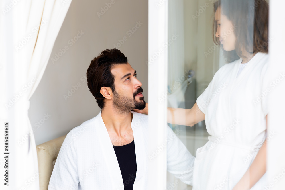 Handsome man look at beautiful woman with love Honest husband and wife stay together at house in the morning. Romantic couple get happy. Mature couple care each other. romantic and love couple concept Handsome man look at beautiful woman with love Honest husband and wife stay together at house in the morning. Romantic couple get happy. Mature couple care each other. romantic and love couple concept