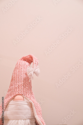 Christmas Tomte wearing a mask photo