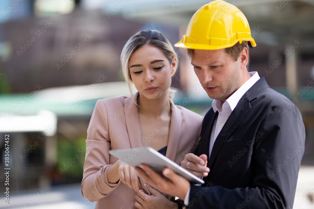 Engineering civil, Construction engineers discussion with architects at construction site or building site of highrise building with Surveying for making contour plans Engineering civil, Construction engineers discussion with architects at construction site or building site of highrise building with Surveying for making contour plans