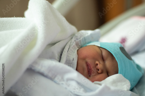 New Born Baby Girl Sleeping on Hospital Bed