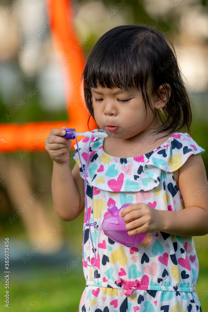 happy asian children playing in playground happy asian children playing in playground