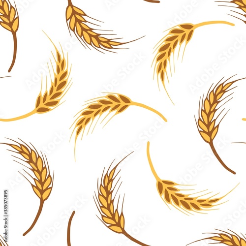 Hand-drawn vector seamless pattern. Golden, brown ears of wheat on a white background. For prints of textile products, packaging, labels. Cereals, flour, bread, pastries.