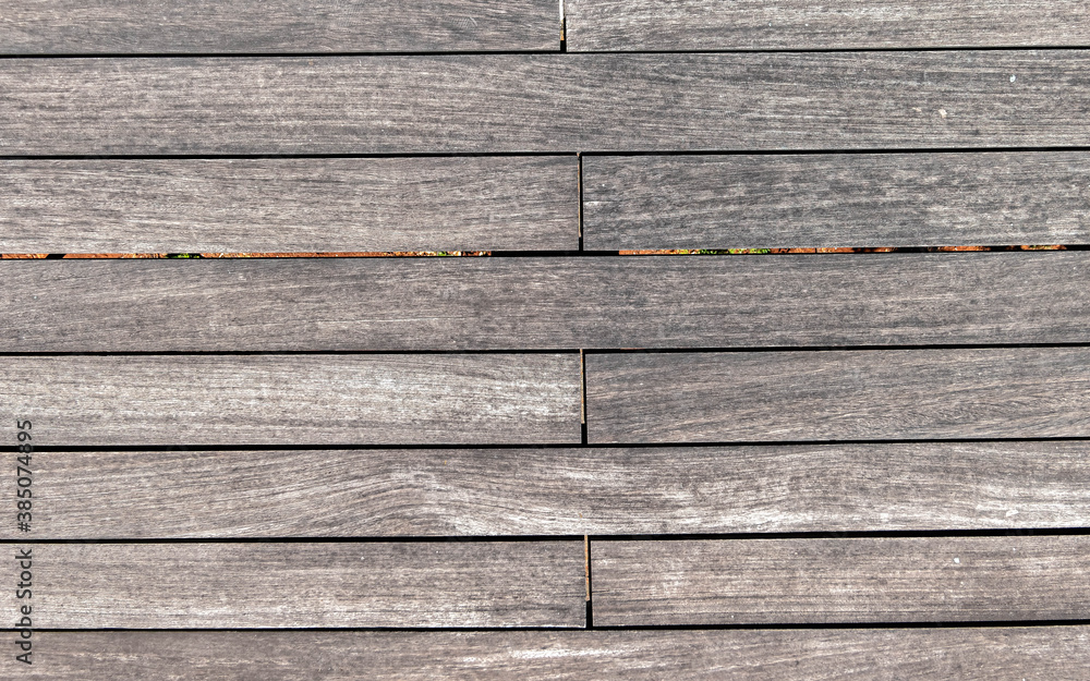 Obraz premium natural greyed wood dock planks top view closeup, textured pattern background