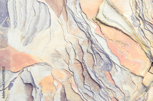 Rock layers - a colorful formations of rocks stacked over the hundreds of years. Interesting background with fascinating texture