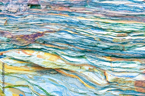 Rock layers - a colorful formations of rocks stacked over the hundreds of years. Interesting background with fascinating texture