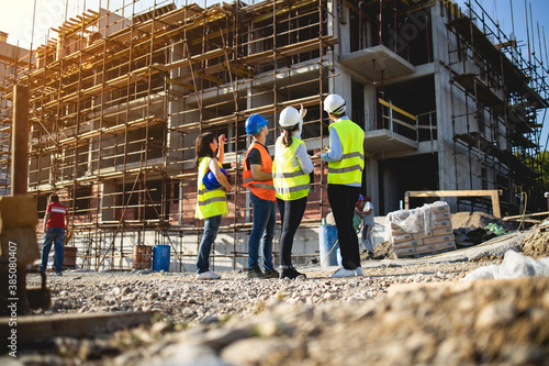 Construction workers having work meeting
