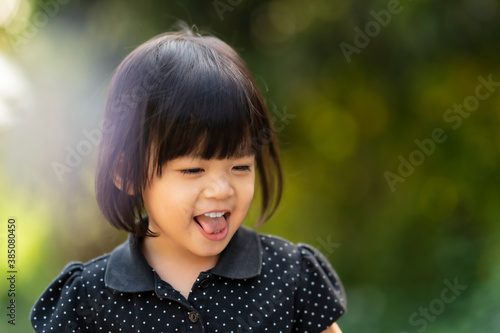 cute asian girl close up with her smile © pushish images