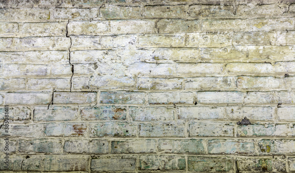 Old brickwork with crumbling plaster. Building wall. Graphic resources. Background. Vintage. Retro. Old brickwork with crumbling plaster. Building wall. Graphic resources. Background. Vintage. Retro.