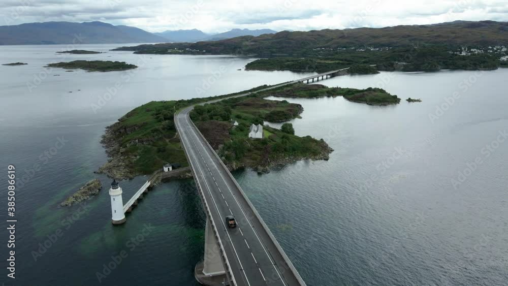 Stunning Aerial Shot Of Kyleakin Lighthouse And Skye Bridge - Road Bridge Spanning Across Loch Alsh In Scotland - mavic air drone Stunning Aerial Shot Of Kyleakin Lighthouse And Skye Bridge - Road Bridge Spanning Across Loch Alsh In Scotland - mavic air drone