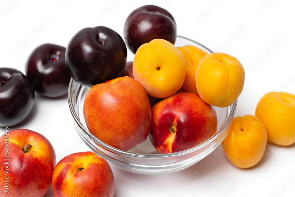 nectarine, peach and plum on a white background nectarine, peach and plum on a white background