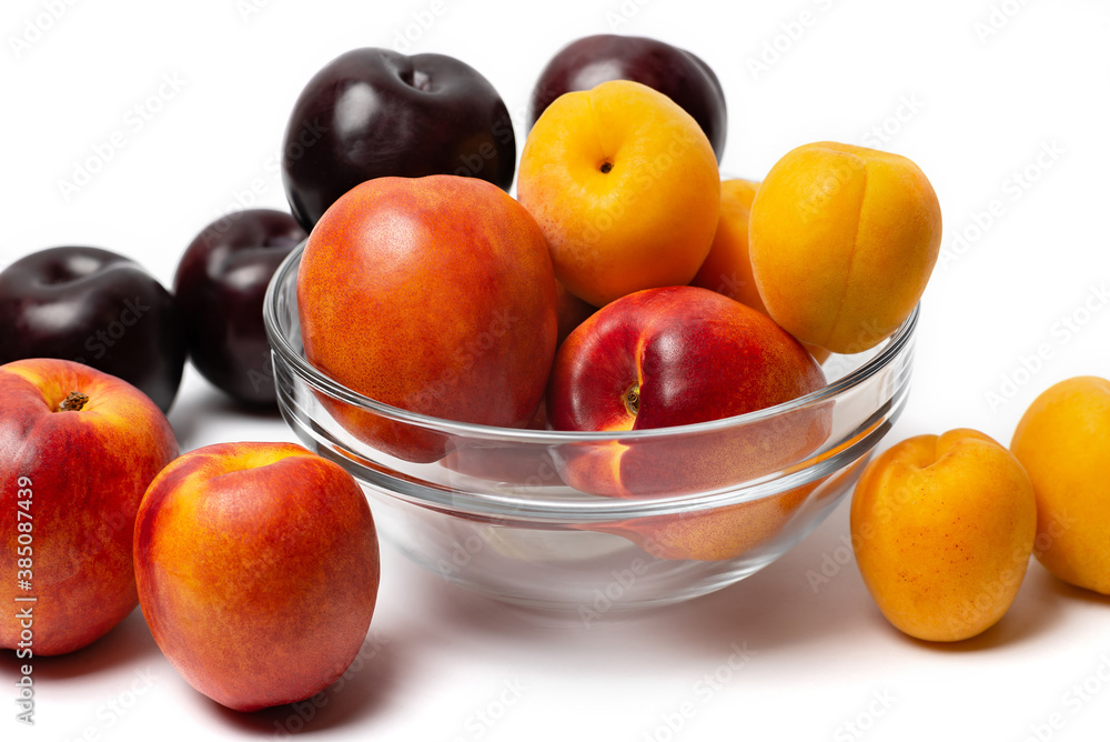 nectarine, peach and plum on a white background nectarine, peach and plum on a white background
