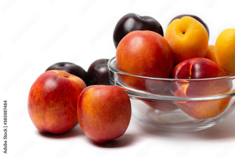 nectarine, peach and plum on a white background nectarine, peach and plum on a white background