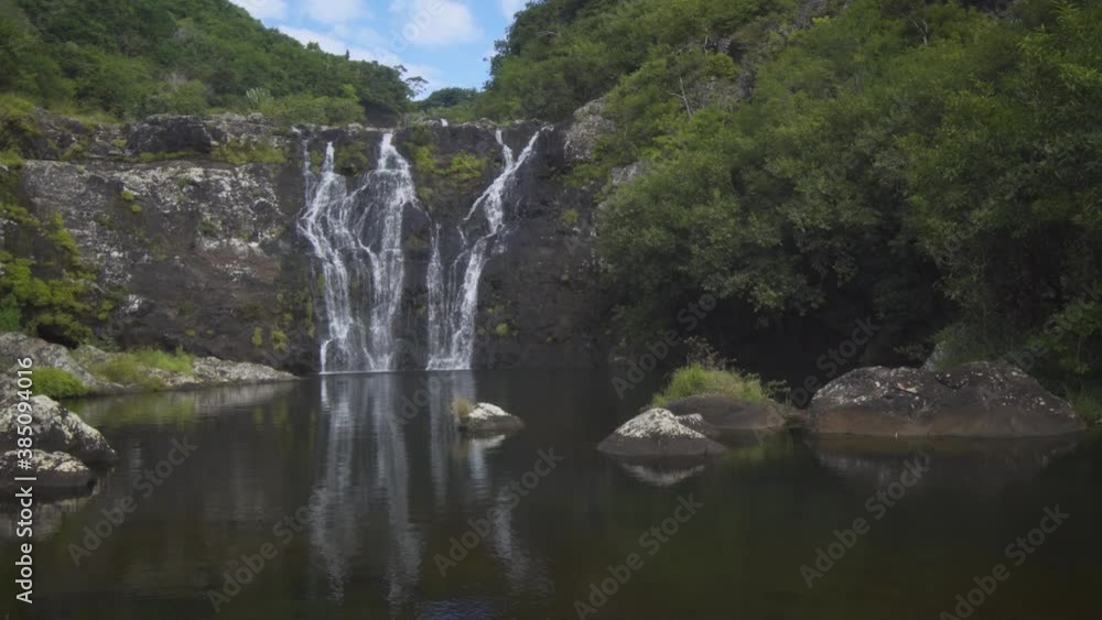 High waterfall and mountain lake. Mauritius island High waterfall and mountain lake. Mauritius island