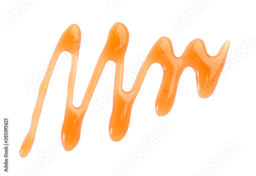 Fotografía Maple syrup drizzle isolated on white background