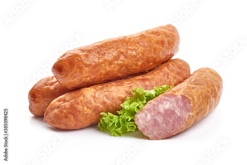 Smoked pork sausages, close-up, isolated on white background