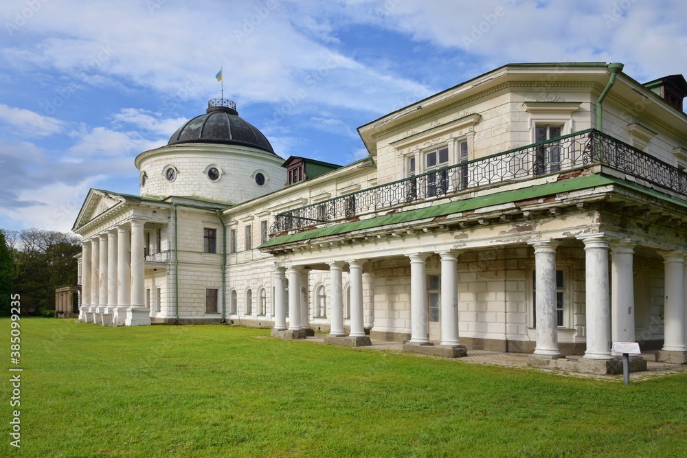 Kachanivka, Ukraine - June 2020: Beautiful ancient Tarnovsky palace and park in Kachanivka. Ukrainian heritage, tourist attractions. Landscape and park design