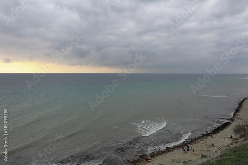 seascape on a cloudy evening in pastel colors