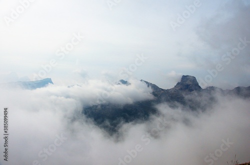 Peak of the rock in the clouds.