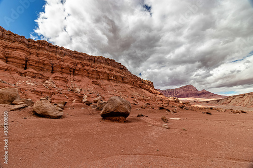 Ever expanding mountain range - coarse ground untouched by humans - Vermillion cliff range, Page, AZ, USA photo