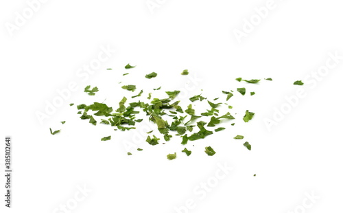 Fresh green chopped parsley leaves isolated on white background. Chopped parsley on a white background isolated. Chopped Parsley Leaves. Fresh Herbs 