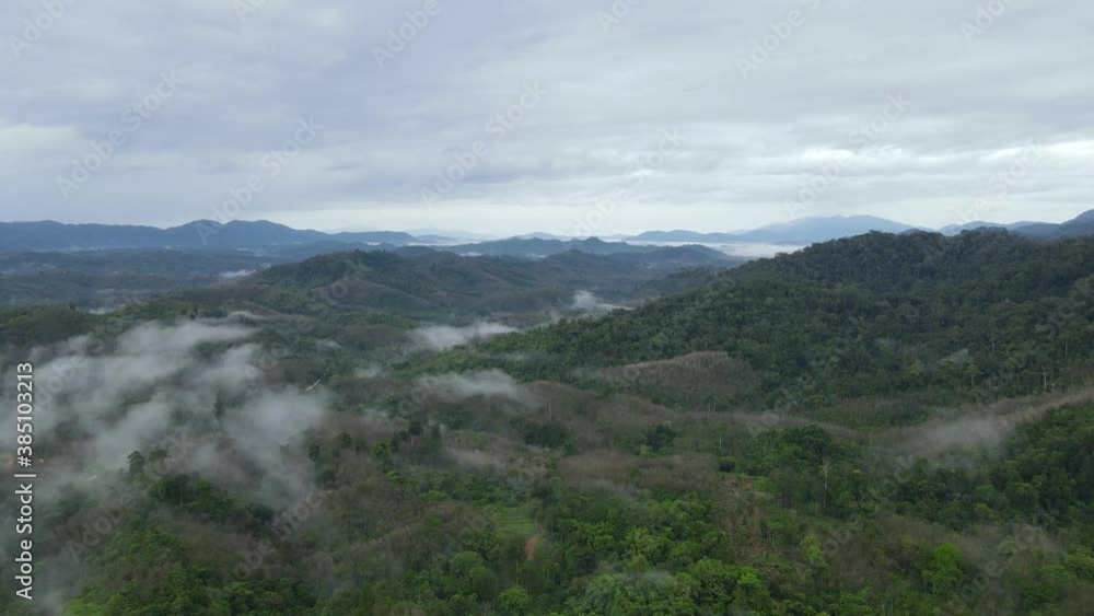 Epic morning Flight over Beautiful mountains and clouds at sunrise on Mountains in Thailand. Aerial view of nice rainy morning in Mountains. Epic morning Flight over Beautiful mountains and clouds at sunrise on Mountains in Thailand. Aerial view of nice rainy morning in Mountains.