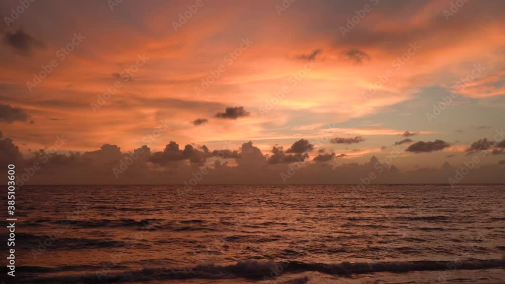 SERIES Red orange sunset sky orange video 4k cloud Red orange cloudscape time lapse background Dark red purple sunset sky cloud time lapse 4k evening clouds moving away rolling Phuket Thailnad. SERIES Red orange sunset sky orange video 4k cloud Red orange cloudscape time lapse background Dark red purple sunset sky cloud time lapse 4k evening clouds moving away rolling Phuket Thailnad.