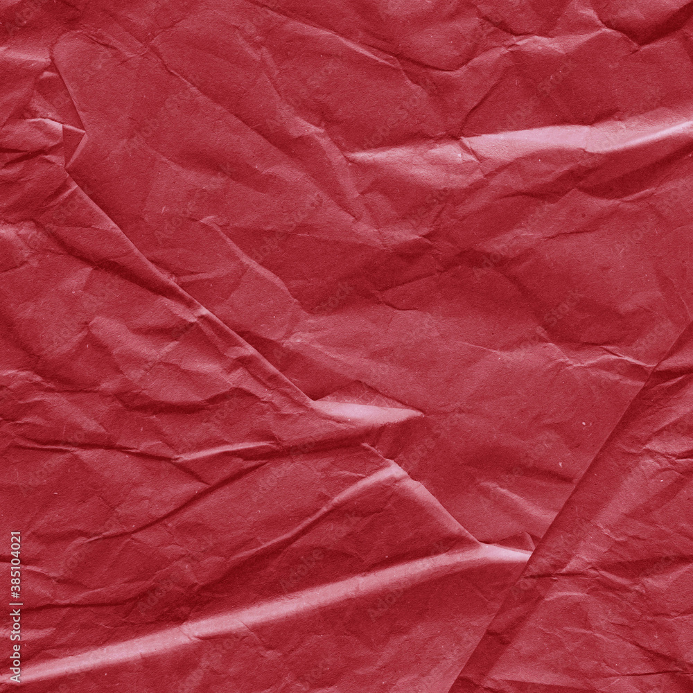 Fototapeta premium Red vintage and old looking crumpled paper background. Retro cardboard texture. Grunge paper for drawing. Ancient book page. Present wrapping.
