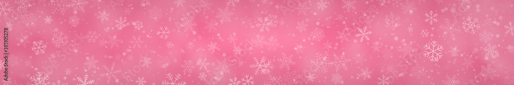 Christmas banner of snowflakes of different shapes, sizes and transparency on pink background Christmas banner of snowflakes of different shapes, sizes and transparency on pink background