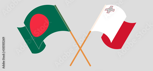 Crossed and waving flags of Bangladesh and Malta