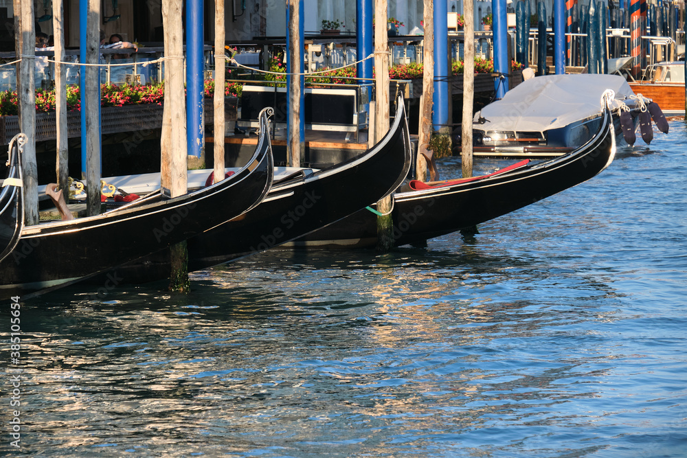 Gondola passenger boats on Grand Canal in Venice, Italy.