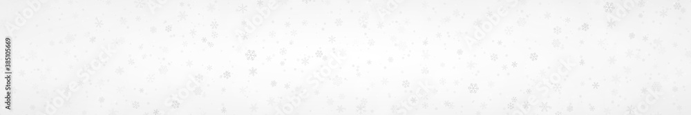 Christmas banner of snowflakes of different shapes, sizes and transparency on gray background Christmas banner of snowflakes of different shapes, sizes and transparency on gray background