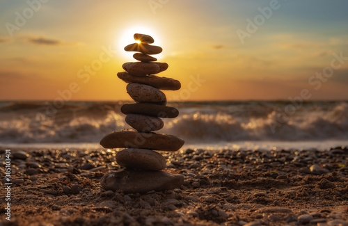 Zen concept. The object of the stones on the beach at sunset. Harmony & Meditation. Zen stones.